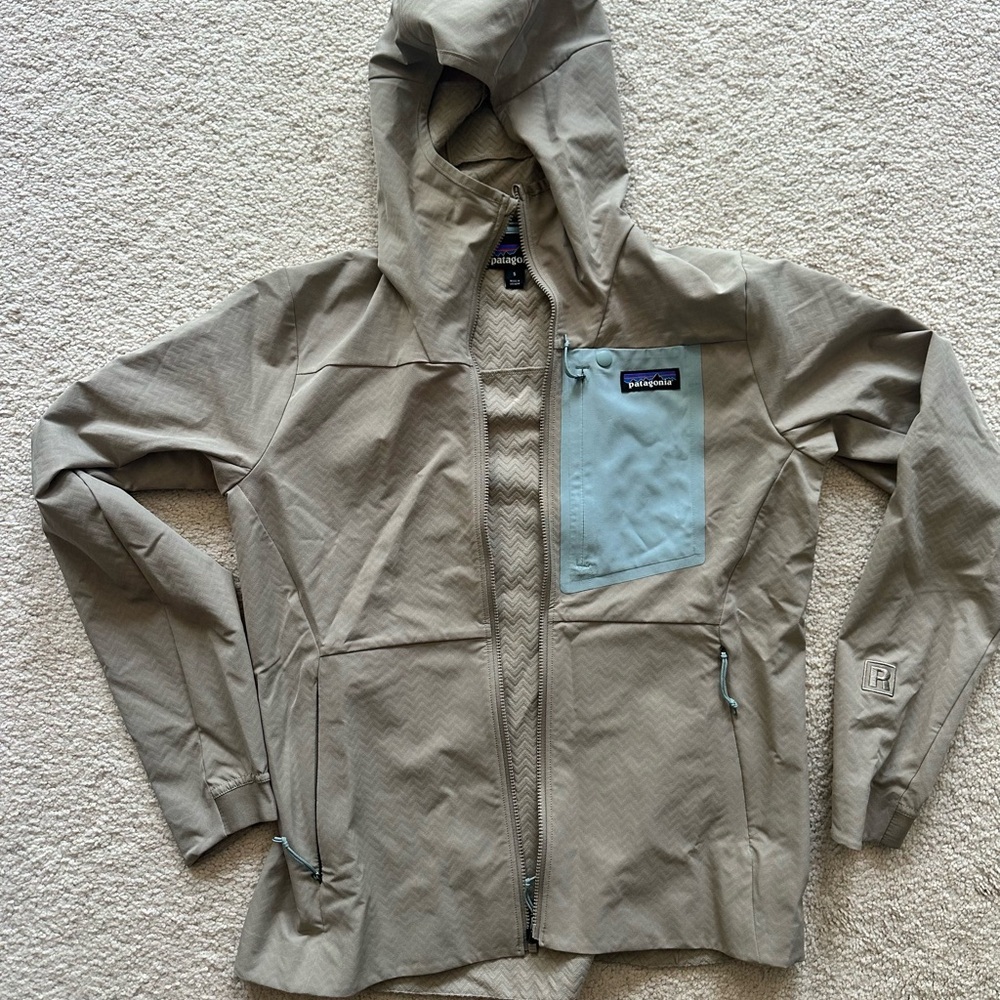 Patagonia Women's Hooded Jacket in Light Tan with Blue Pocket